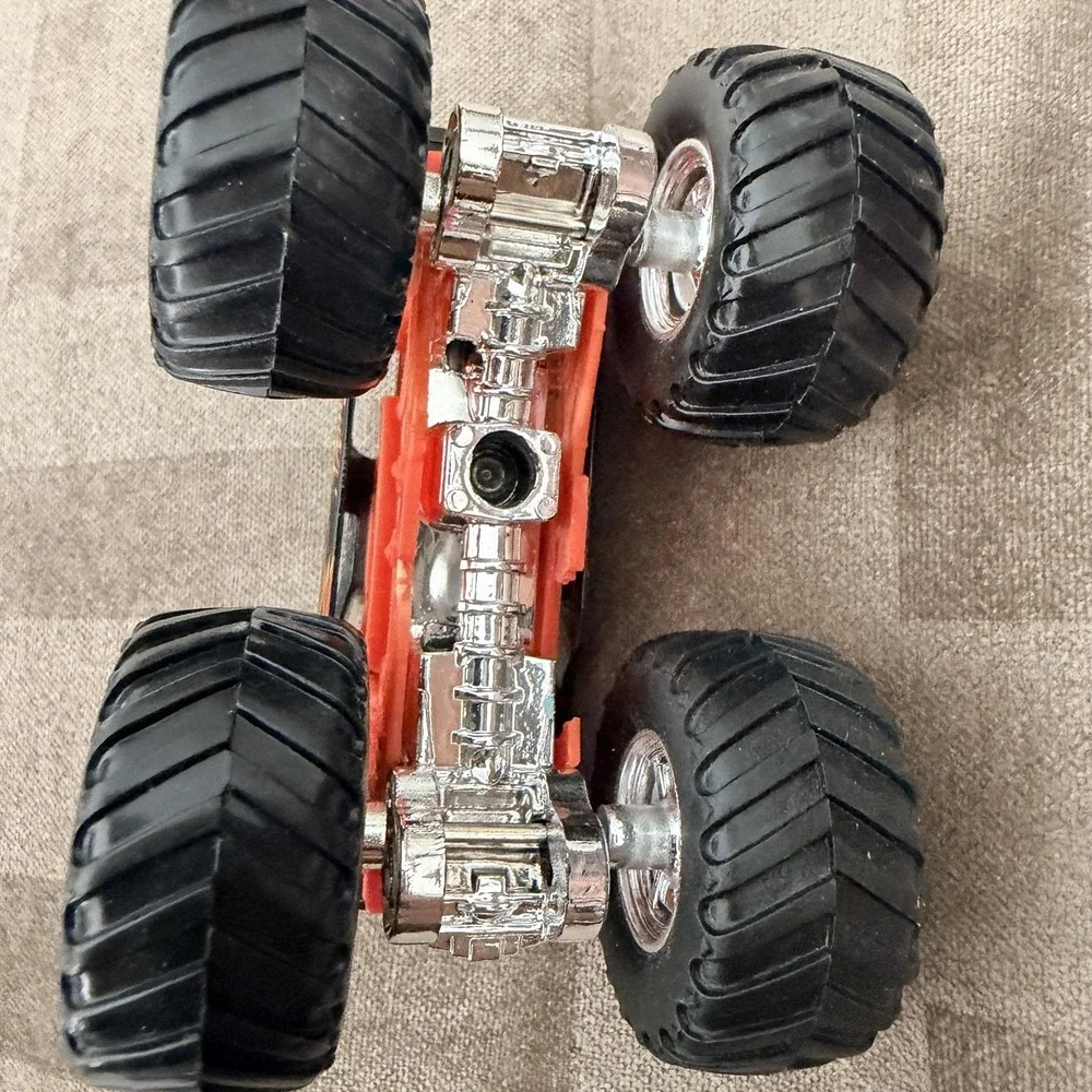 VTG 2006 Hot Wheels Screamin' Demon 1:64 Monster Jam Truck Toy Black Red Flames